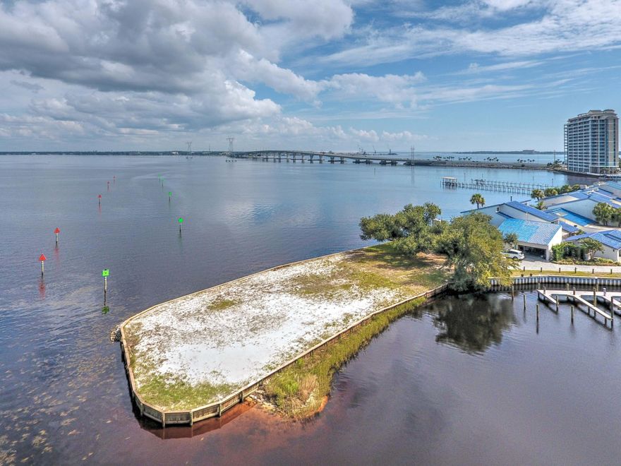 Incredible piece of waterfront. The only one like it left on the beach side of Bay County. Almost 360 degree views of the bay. Deep water access for the boating enthusiasts. Only a 15mn boat ride to Shell Island or the Gulf of Mexico. View of the bridge at night is just stunning. The sunrises aren't bad either. This peninsula is surrounded by the bay. 443' of actual waterfront property.