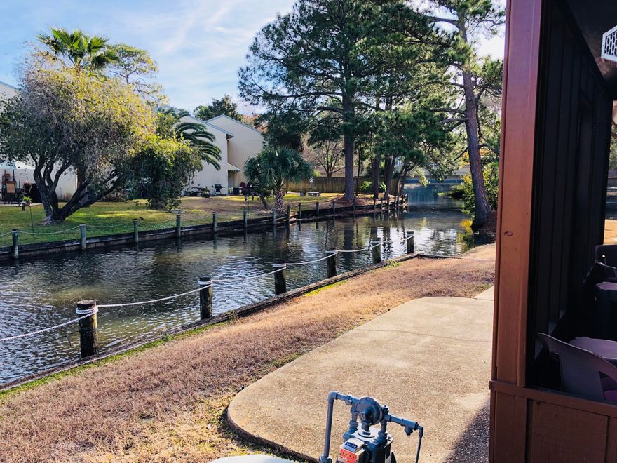 This spacious three bedroom townhome located in Gulf Highlands Beach Resort sits on the canal and has its very own yard space with picnic table. The master bedroom is located downstairs and has two giant walk-in closets and huge master bathroom. Two spacious bedrooms upstairs have their own full bathrooms as well. One half bathroom on the first floor and laundry is located on the first floor as well. This townhome has a screen in porch and plenty of outdoor space for playing and cookouts. Gulf Highlands has eleven pools, four of which are heated. Other amenities include put-put green, playgrounds, shuffle board, four tennis courts and a newly renovated exercise room. The club house has a great menu and is open year round. Just steps from the beach, this townhome must be seen in person.