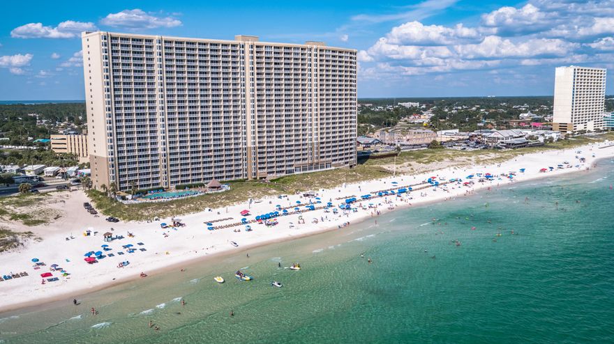 UPDATED! UPDATED! UPDATED! 1BR/2BA Condo in Beautiful Emerald Beach. This lovely unit backs up to the World's Most Beautiful White Sand Beaches & Emerald Coastline. Recent Upgrades: New furniture, flooring, artwork, stainless appliances & paint. Your own laundry room & granite countertops & custom cabinets. Fabulous sunset views! Sink your feet into the plush white sand & right into the Emerald Coastline gulf. Just a few minutes to Pier Park shopping, fine dining and entertainment. Emerald Beach Resort Offers Multiple Pools, Spas, Fitness Center, Valet Parking, 2 Parking Garages, Sky Bar , On-Site Starbucks, Snack Bar, Tiki-Bar, and more.