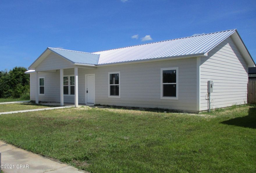 NEW CONSTRUCTION ALERT! Open the door and say wow! 4 bedrooms, 2 full baths and a great split floor plan that is perfect for every family.  The seller spared no expense when building this home.  Metal roof, blown in insulation, granite countertops and gorgeous upgraded cabinets in the kitchen and baths, vinyl plank flooring through out the entire home, a spacious laundry room, 2 car garage and more! This home is close to Tyndall AFB, schools, parks, ball fields, shopping, and the beautiful beaches are only a short drive away. Call today for your showing!