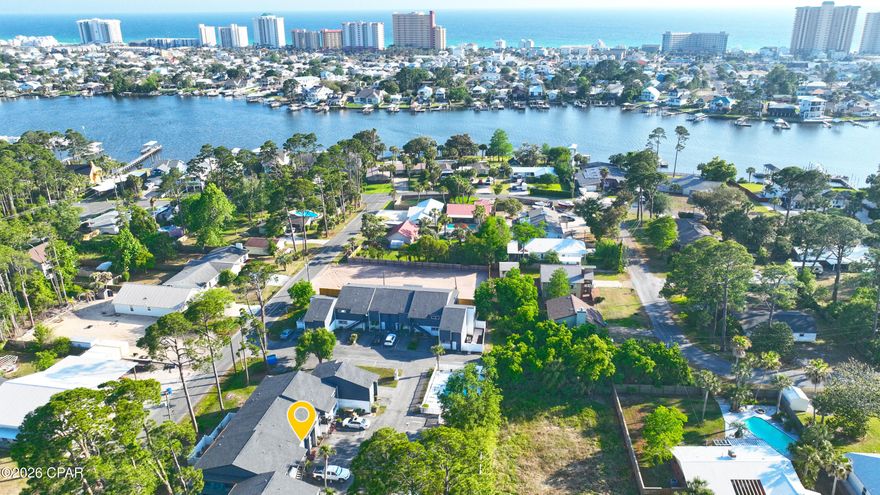 Fully furnished updated unit! Great investment opportunity as a vacation rental or a permanent place to call home. Located right off North Lagoon in a quiet community and just a few minutes away to the beach, popular local restaurants and St. Andrews State park. This lovely unit has new carpet in both bedrooms and hallway along with a brand-new A/C and water heater. The vinyl fenced courtyard adds privacy for children and pets. Comes with 2 assigned parking spaces and has additional guest parking available. The community pool is just steps away as you walk outside the unit. The HOA includes, BBQ Pit/Grill, trash, Ground Keeping, Insurance, Pest Control, Pool maintenance, Sewer, and Water. All measurements are approximate. If important, please self-measure. Call for more information or to schedule your showing today!