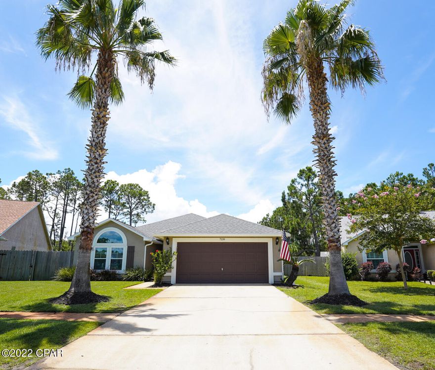 Nestled on a quiet cul de sac in Magnolia Place, this beautiful beach home is centrally located on Panama City Beach just a 10 minute drive to the beach, grocery stores, and local restaurants. Enjoy having the biggest back yard in the neighborhood perfect for barbecues and entertaining, and plenty of room to add a pool! The 4 BR, 2 BA home is well taken care of with fresh paint, new windows, 2019 roof, 2018 HVAC, 2018 New Insulation & 2021 Water Heater. Enjoy low maintenance living with everything being like new. As you enter the home, you will be greeted with a spacious living room featuring vinyl plank flooring and gas fireplace. The kitchen is updated with granite counter tops, Gas range, refrigerator, dishwasher, microwave all conveying. Kitchen has an attached dining room and overlooks the living room. Large Master BR with plenty of room of King bedroom suite and attached Master BA. Three additional bedrooms with shared hall bathroom offering tub/shower combination. There is a screened patio, grilling area and huge fenced back yard with endless possibilities. Laundry room w/ extra cabinet storage; Two car garage w/ storage shelving; This is a turn-key home! Don't miss out on this rare find 4 bedroom home on Panama City Beach!