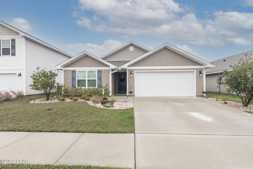 Look at this beautifully landscaped like new home! Built in 2019 the ever popular Ryder model, boasts 4 bedrooms, 2 bathrooms and over 2000 sq.ft of living space, with a water view from the backyard, no neighbors right behind you! This home is immaculate, better than new with a ton of upgrades: Fenced backyard, gutters, closet systems, ceiling fans, blind package, Stainless Steel appliances, storage racks in garage and Solar Panels. The home is equipped with smart home system and video doorbell.  The layout is one of the most popular floorplans with a an open concept perfect for entertaining. The large en-suite master is an oasis with walk-in shower, double sinks and tons of closet space.  The huge kitchen with a large pantry and island, and breakfast bar is exceptionally laid out with lots of cabinets and extra storage space.  The Bridge Harbor community is only minutes to Tyndall, AFB, shopping and restaurants, and has underground utilities, sidewalks throughout and a large community pool with areas for grilling. This is an exceptionally well designed community. Set up your appointment today for your private showing!