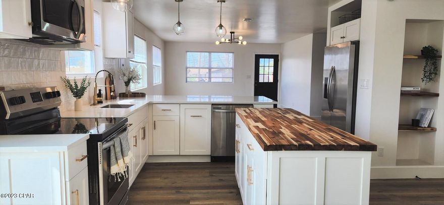 UNDER CONTRACT TAKING BACKUP OFFERS! Completely and beautifully renovated home with a modern European touch! This spacious home boasts a luxurious and accommodating kitchen that opens into the generous living room, and offers modern lighting and ceiling fans, black mirrors, bath fixtures & door knobs, and luxury vinyl plank flooring throughout. Park your vehicles in the private, over-sized garage in the back of the house. The huge yard provides plenty of entertaining space and unobstructed views of the pond behind the property. Located on a quiet cul-de-sac with beautiful curb appeal. Close to schools, hospitals, shopping and more.