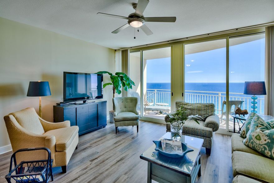 LOWEST PRICED CONDO IN AQUA..NEW FLOORING!! NEW PRICE!! Perched along the beautiful Gulf of Mexico and perfectly located just one block away from fabulous Pier Park, Aqua sets the standard for Panama City Beach. This unit offers a fabulous floor plan and is very popular for rentals, as it offers 2 bedrooms, 2 full baths and additional space that is easily used for bunks. Picturesque gulf views from almost every room, tasteful furnishings, and ample gulf front balcony makes this unit perfect for relaxing and so easy to keep the sand between your toes within just a few steps off the elevator. Owner has just installed new flooring through the hall, kitchen, living and dining room. It's a must see. Aqua offers premier amenities in addition to beautiful architecture as well as the sought after coastal vibe in a very upscale manner. Indoor/outdoor pool, separate hot tub, beachside grilling area, exercise facilities, garage parkinG with walkover for convenience, exquisite lobby and common areas...there is not much else you could ask for.
