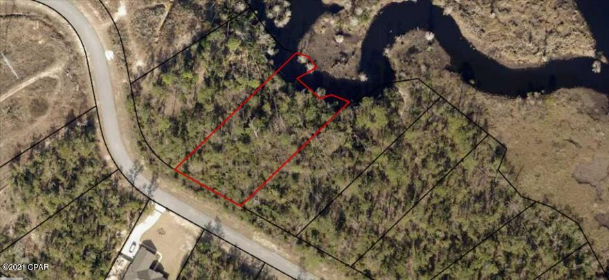 Beautiful view of the creek. Wooded lot located in an attractive neighborhood. The covenants on this subdivision require homes to be 80% Brick and minimum of 1,800 square feet heat & cool space. Subdivision features underground utilities and public water. This is a beautiful country setting and the perfect place to build your dream home so get out and take a look today!