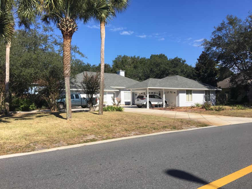 Entered for comp purposes.  Updated kitchen, floors, paint, and bathrooms.  Fenced backyard with two screen porches and three car garage