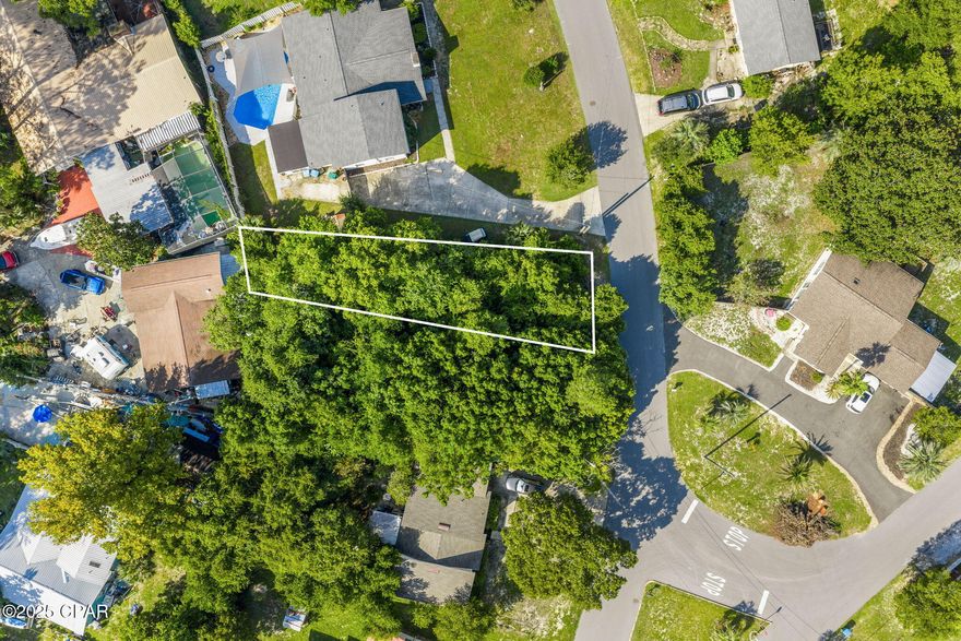 Fantastic opportunity in one of the most desirable locations in Panama City Beach! Situated just over a mile from the sugar white sands and emerald waters of the Gulf, this property offers the perfect spot to build your dream home or investment property. This is for one of the 40x120 lots. No flood zone and only a short walk to Frank Brown Park through the new Escanaba Way trail, you'll enjoy access to some of the best recreational amenities in the area. Frank Brown Park features baseball and soccer fields, basketball courts, playgrounds, fishing lakes, walking and biking trails, a dog park, skate park, and the aquatic center with two swimming pools and splash areas. Pickleball courts are also coming soon! Enjoy the convenience of being just minutes from Pier Park, dining, shopping, entertainment, and the beach, while still tucked away in a quiet residential neighborhood with no HOA fees. No mobile homes, apartments, or vacation rentals nearby help maintain the charm and appeal of the area. City utilities are available and no septic tank is required. Conveniently located near Highway 79 and the new hospital, this is a rare chance to secure a homesite in a rapidly growing area of Panama City Beach. Call today for more details