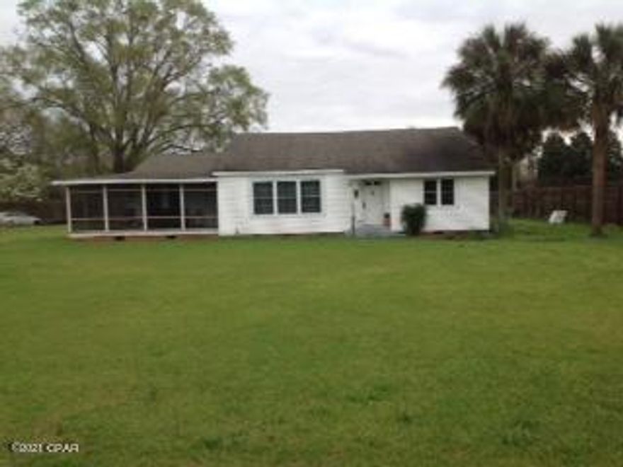 CURRENTLY UNDER CONTRACT SELLER ACCEPTING BACKUP OFFERS. 4 BR 2 Bath 2330 sq.ft. Very large rooms throughout, huge walk-in closets in all bedroom. Hardwood floors, New Windows. Separate Dinning Room with Built-in Cabinets, Separate Breakfast Room, with Built-in Cabinets.

Nice size working kitchen, (floor covering needs replacing) non wood burning fireplace. Large wrap around covered and screened patio, with porch swing, need some TLC. This house was brought to code in 1971. Interior recently painted, crown molding throughout. Great Home for the Money.