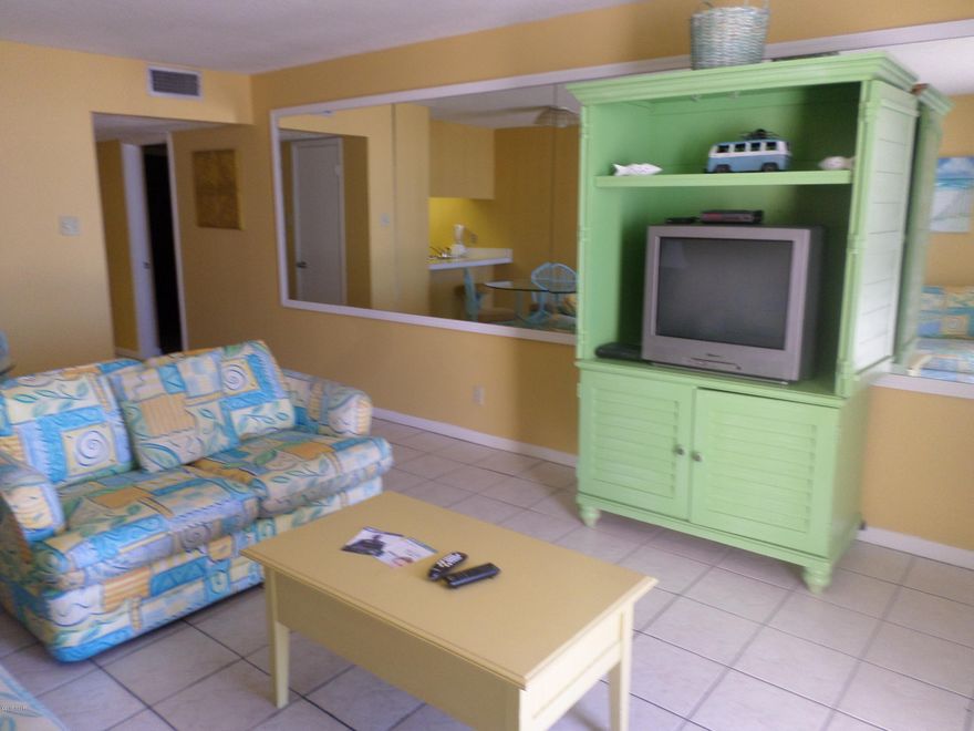 MOTIVATED SELLER..BRING AN OFFER..Edgewater Beach Resort..Windward Tower...THE MID-RISE BUILDING.. Only 6 stories high at the very quiet end of the resort.  Enjoy this 1st floor unit with fresh paint and large living area.  You can almost touch the beautiful sugary sandy beach right from your very own balcony.  The Master Bedroom Suite offers a private bath and laundry area.  The second bathroom is large and located away from the living area.  This unit offers tile throughout.  The Windward/Leeward buildings are in the quiet section of Edgewater and offer their own pool and beach access, as well as a BBQ grill.  The resort offers 11 pools and several hot tubs, golf course, tram service, spa, Ocean's Restaurant right on the Gulf and much more.  Come see for yourself what paradise is like!