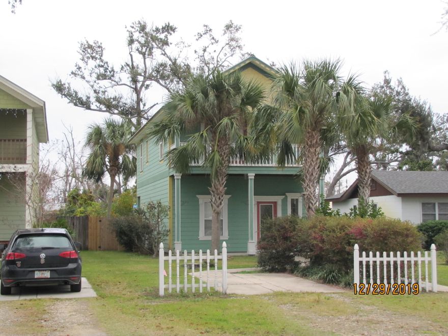 Adorable Key West inspired home looking for a new family. Located in the heart of Panama City, and sitting within walking distance to the bay and some of the most beautiful sunsets you will ever see. This lovely home features hardwood and tile floors. Very open floor plan great for entertaining. The kitchen is well equipped with all stainless appliances, a great center island, tons of cabinets, granite counter tops and a step in pantry. High ceilings and unique trey inlay in the kitchen ceiling make this home adorable. Crown molding throughout and around all the windows. Upstairs boasts a landing large enough to accommodate a computer desk and built in shelving. Two large bedrooms, one has a large walk in closet and the other has two separate closets. Both rooms feature hardwood floors.