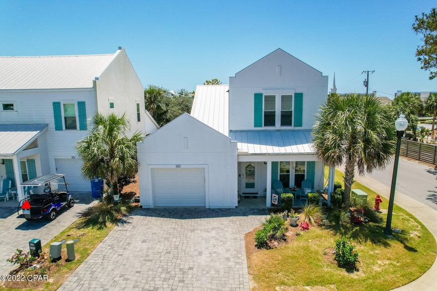 FANTASTIC location between Front Beach Road and Back Beach Road just a 10 MINUTE WALK TO THE BEACH! Only minutes in the car to Pier Park for shopping, entertainment, and dining, and Frank Brown Park for events and sports. You're truly in the heart of the happenings of Panama City Beach. This beautiful 3 bedroom, 2.5 bathroom ''West Indies'' style home features an open concept in the main living space, a formal dining room, a main ensuite, and easy-to-clean vinyl plank flooring, all on the first floor. Stylish features throughout the home include wainscotting along the staircase, a cobblestone driveway, plenty of windows allowing for an abundance of natural light, and a custom tiled, spa-like shower in the main ensuite. Enjoy being located directly across the street from the community pool! Don't miss out on this one, call TODAY!