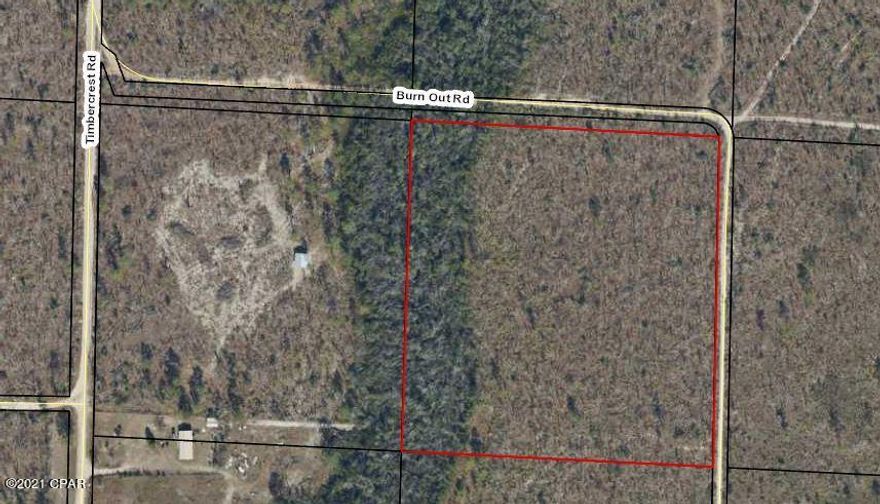 If you are ready to get away from it all, this is a great 10 acre parcel of land. Burn Out Road runs beside the property and is a county easement. Roads are sandy.