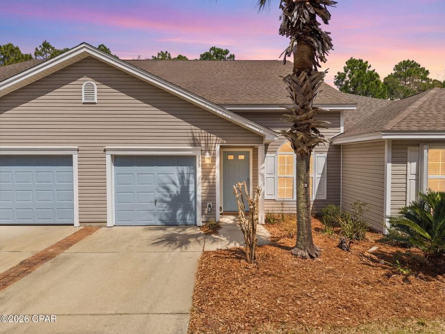 Just minutes from the World's Most Beautiful Beaches and directly across from Pier Park this beautifully updated 3-bedroom, 2.5-bath, two-story townhome with a loft offers the perfect blend of location, comfort and style. Located in the desirable Palmetto Trace community this home features an open concept layout and numerous recent updates throughout.

The unit opens to the family room with luxury vinyl plank (LVP) flooring throughout, which flows into the kitchen. The kitchen overlooks the screened-in back porch that backs up to a wooded area providing additional privacy. The kitchen has been updated to include granite countertops, a tile backsplash, double sink, painted cabinets, updated hardware and recessed lighting. There is also a half bath downstairs for guest convenience featuring a new vanity, toilet, and mirror.

The primary bedroom is located downstairs. The primary bathroom and walk-in closet have been remodeled and expanded. The primary bathroom features double bowl sinks, tile flooring and a large tiled shower. The toilet was repositioned for improved layout.

Upstairs you will find two additional bedrooms and a full bathroom along with the loft/flex space. The upstairs bathroom has a tub/shower combo. It has been remodeled to include an updated vanity with double sinks and a new toilet. 

The neighborhood streets are lined with beautiful canopy Live Oak trees and mature landscaping. The community features a neighborhood pool and sidewalks throughout. 

The HOA covers landscaping/irrigation, annual pressure washing, community pool & common area maintenance.

Major updates include all new interior paint, exterior door and garage paint,  new roof (2023), AC (2018), water heater (2025) and hurricane shutters. 

There is a 0.5% new owner fee payable to the St. Joe Foundation at closing. Buyer to verify all information deemed important.
Come see all this home has to offer.