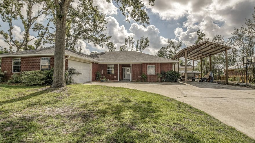 This wonderful home in the ever-popular Lynn Haven, is now available and has everything you could need or want. The main house offers three bedrooms, each with their own bath and walk-in closet. in addition to a half bath for guests. As you enter the home you are in the open and bright living room and dining room areas. The floor plan is a split bedroom and the spacious master bedroom has a very large walk in closet. The master bath offers a double vanity, whirlpool tub and separate shower with double showerheads. The large kitchen has loads of cabinets and countertop space,  a breakfast bar, wall oven and tile blacksplash. It is open to the family room that has built-in bookshelves and a fireplace. The exterior of the home also has so much to offer. In addition to the attached oversized two-car garage with new opener, there is covered RV parking with electricity, also great for a boat. The back yard is newly fenced and has a large in-ground pool that has been recently refinished , a newly painted pool deck and a hot tub in addition to plenty of remaining yard beyond the pool. There is a very open pool house with a full bath (with pool access) that would be a great mother-in-law quarters, at-home office, studio apartment, additional teenager bedroom or just a great additional outdoor entertainment space. The sprinkler system has a separate irrigation meter. The roof is new as are the outside A/C unit and there are new windows throughout the home. Make your appointment today!