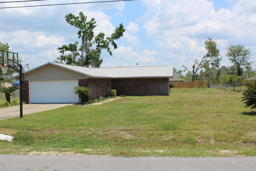 Country living and still close to all amenities, Tyndall AFB, Shopping, Restaurants, and beaches. This 3 bedroom 2 bath newly updated home boasts, new roof, new insulation, new garage door with opener, new A/C, new bathrooms, new paint, new Kitchen with new Appliances , Granite counter tops in the kitchen, with subway tile backsplash.  Tile in all areas except the great room. Two car garage floor has new epoxy paint. Almost new home on .52 acres. Make your appointment today. Waiting on granite counters to finish the kitchen. 3 weeks out.