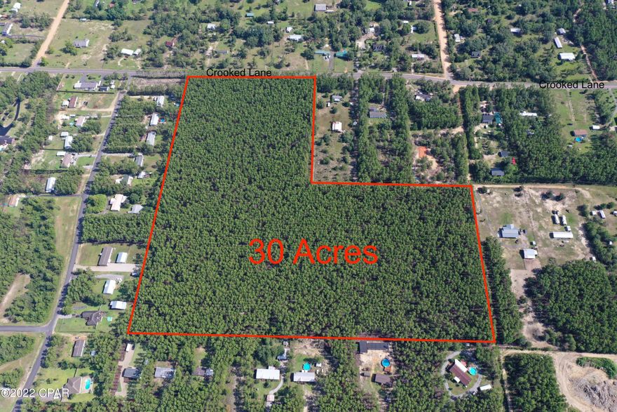 Great High and Dry wooded 30 acre parcel. Zoned residential. Perfect for large homesite, farm, or 30 lot residential neighborhood.