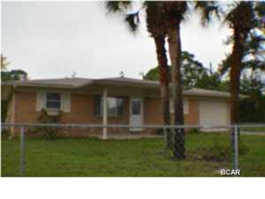 Nice move in ready home on quiet corner in Sunny Hills. Property is chain-link fenced completely. Brick ranch style home with living room open to dining area. master bedroom has private bath and large walkin closet. Second bedroom with carpet close to additional bathroom. Small additional room could be used as office. large Den on back of home (has been used as 3rd bedroom) open to spacious screened porch. This one wont last long!!!!