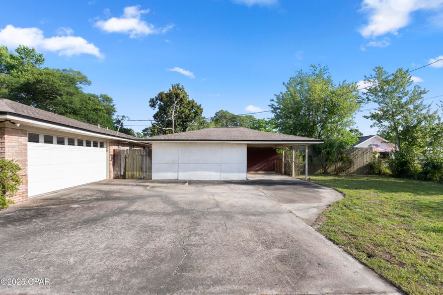 'CURRENTLY UNDER CONTRACT, SELLER WILL CONSIDER BACKUP OFFERS  It is rare that houses come available on this street and this large unique Ranchette, all brick home is one of a kind that can't be missed.  Boasting 2.88 acres this property includes a barn that can occupy horses or other animals, a large pond on the back end of the property that houses fish, and many different fruit trees and excellent oak trees for shade, comfort and a beautiful view.  With 4 bedrooms and 4 full bathrooms this home has had many upgrades and updates done over the last few years.  Please see the full list of updates to the home in the document section of this listing.  There are 2 master bedrooms with ensuites in this home, which is very unique. This unique split floor plan home makes the first master suite have ultimate privacy.  All bathrooms have been totally remodeled in 2023/2025 and updated with a bright and luxurious airy feeling.  The kitchen has also been totally remodeled and updated in 2022 with all of the cabinetry as custom 'soft close'- that also has under cabinet lighting.  There is a dual convection microwave and a convection oven with an induction cook top with a down draft, a gorgeous island for extra storage, all new flooring, stainless steel appliances, Corian countertops, and much much more.  The 'bar' area is just off the kitchen and living room.  Make yourself a cocktail or a mocktail after a long day as you enjoy the peace and tranquility in this exquisite home.  Another unique feature of this home is that is has a central vac system which makes cleaning each room easy.  The home has all new LV blinds throughout the house. The living room has a wood burning fireplace to snuggle up to in the winters. The washer and dryer were installed in 2018 and are included with the sale.  There is a 5500-watt portable generator with a 4 circuit setup in the garage that will be included.  There are two water heaters.  The water heaters- one was installed in 2024 and one was installed in 2020.  The roof was installed in 2019. As an extra bonus, when entering from the side of the home there is a mud room where the washer and dryer are located, extra storage is available with a place to store your shoes.  You can come in, change your shoes, and close this door as an extra side area as part of the house.  If you are looking for a spacious home, with a large piece of property close to shopping, the Navy Base, restaurants, and not too far from the beach, then this is your find!  Make an appointment and come view this Ranch style home.  Seller is offering a Home Warranty-AHS!