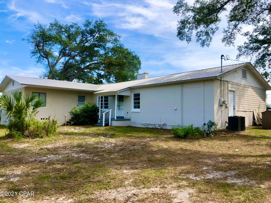 CURRENTLY UNDER CONTRACT, SELLER ACCEPTING BACKUP OFFERS--Here's a 4 bedroom, 2 & 1/2 bath, with office space. Stainless Steel appliances and granite counter tops await you in the kitchen, new roof in 2019. tile and new carpet, central heat and air, separate dining rm, fireplace in great room. Centrally located on 11th Street between Lisenby and Balboa, you can be anywhere you need in just minutes.  2 blocks away from Saint Andrews bay.  Walk to the bay and sit, relax and unwind. Home comes with a 1 year warranty.