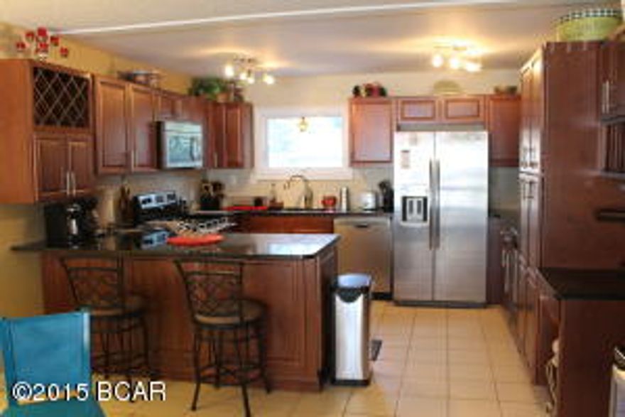 This is probably the nicest Golf Villa in Bay Point. The popular ''garden style'' floor plan which is all on the ground floor. Completely remodeled and designer furnishings. Wood burning fireplace, stainless appliances, separate wine fridge, granite bar... The list goes on! Private courtyard and another back patio overlooking the Meadows Golf course. You really need to check this one out.