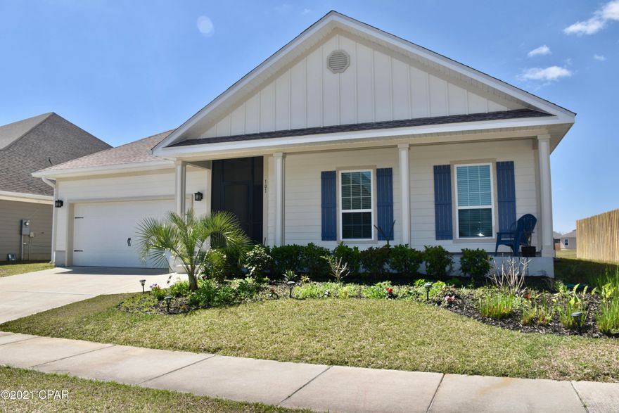 Welcome home to the Villages of Mill Bayou with a gorgeous community pool.  This beautiful like-new home is located only minutes to restaurants, shopping, and some of the best schools in Bay County. With over 2250 sqft, this 4 BR 3 BA has new paint throughout and is ready for your family. Entering the home, the front porch entry area is screened-in for extended privacy to kick off your shoes or simply open the front door for an afternoon breeze. The extended foyer leads into the spacious living room highlighted by double tray 10' and 11' ceiling, crown molding and recessed lighting. The living room, kitchen, and master bedroom overlook the backyard with a view of the pond. The open concept of this home with a generous sized entertainment space extends to the kitchen and dining area. The kitchen offers granite countertops, a walk-in pantry, stainless steel appliances, and an abundance of storage. Flooring throughout the home includes manufactured hardwood in the common areas and kitchen, tile in baths, and carpet in the bedrooms. Enjoy the privacy of a split floor plan between the owner's suite and the three additional bedrooms. The owner's suite is highlighted by the 10' tray ceiling. The master bath includes a tiled shower, garden tub, granite double vanity, seperate water closet, and a lead in to the large walk-in closet.  The laundry room comes complete with storage and included washer and dryer. Home has an attached two car garage with attic storage above. Relax, grill, or watch the kids or your pets play in your backyard from your screened-in covered porch. This home comes with irrigation, is fully landscaped and situated in a great neighborhood.  Finally, take an evening stroll through this inviting neighborhood and enjoy the gorgeous views of the bayou! 

This home has it all! Call for your private tour today ... it won't disappoint! Measurements approx; verify if important.