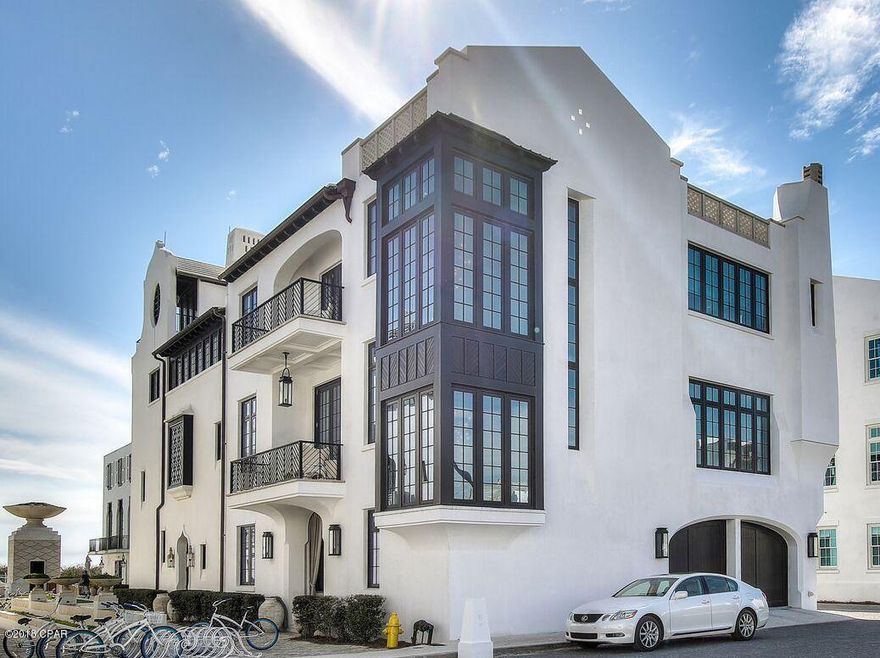 Exquisite Alys Beach home with forever Gulf Views!!! Four bedrooms, four and a half baths, highly coveted, full sized, two car garage and a custom designed elevator! From the rooftop terrace, enjoy amazing sunsets by the fireplace or the outdoor entertainment center. Never rented, this luxurious home is located on the Gulf Green, just steps from the white sand. Newly constructed, Architect Domin Bock designed a stunning example of modern elegance. The attention to detail is exquisite from quartz tile in the foyer to the custom kitchen with the spectacular Woodmode cabinetry and the Mother of Pearl backsplash is exquisite surrounding the Thermador Range. The beverage center built with double refrigerator drawers, wine coolers and an ice maker is perfect for