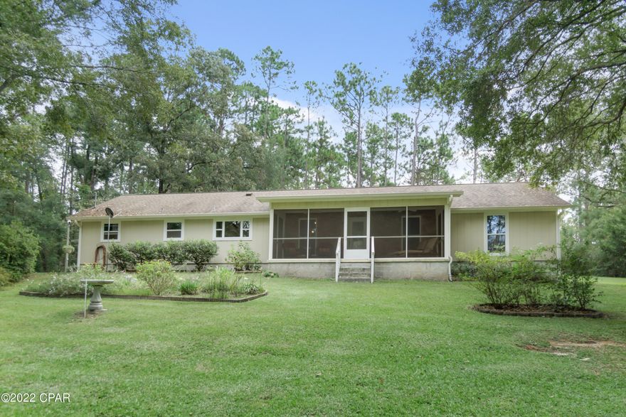 Great location ! Private setting but close to shopping and medical. Home sits on 3.64 acres down a private drive. Front and back screened porches to enjoy the outdoors and entertaining .Home features 3 bedrooms and 2 full baths. The home had a total remodel in 2012. Master bath has a large tile shower. Kitchen had all new cabinets with granite countertops at this time. Utility room is off the kitchen.Living Room features a woodburning fireplace. This is a must see home. Make an appointment soon.