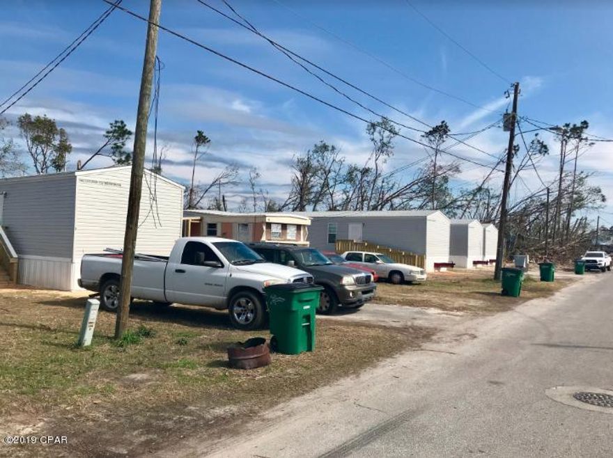 Income producing mobile home park in a great location. Own the land and collect lot rent for little to no maintenance. 7 tenant owned homes at $300/month. All homes are separately metered for water/electric with utility expenses paid by tenants. 4 of the homes are FEMA homes. Seller pays approximately $425/quarterly for garbage, $820/annually for taxes and 5% property management fee. This is a cash cow that will not last long!