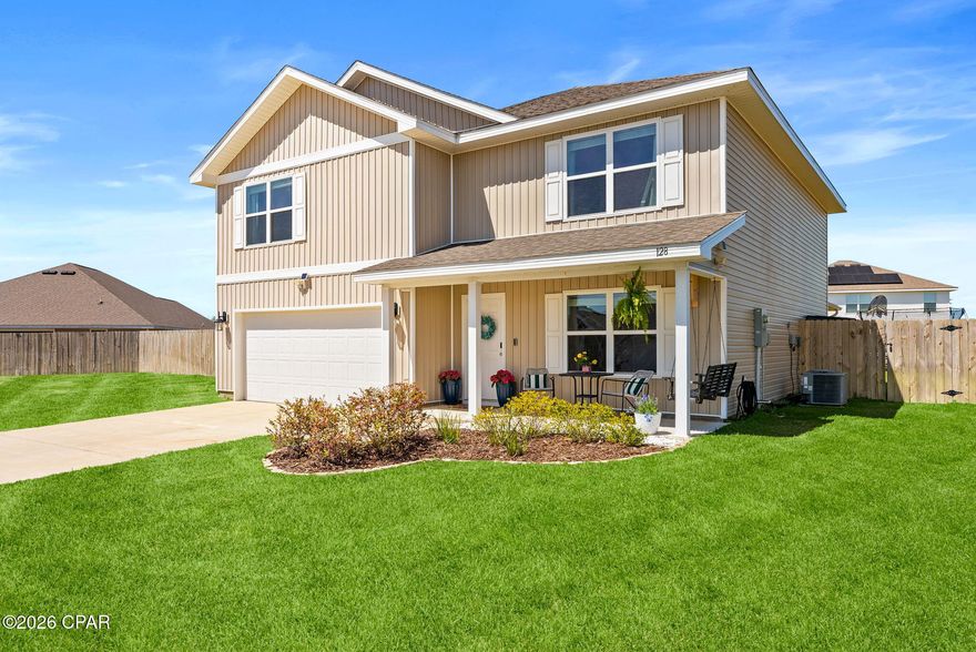 This flexible two-story home offers 5 bedrooms and plenty of storage. The entry features a versatile flex room (perfect for office, dining, media, or playroom). The open-concept family room flows into a large breakfast nook and covered back porch.
The kitchen includes a center island with sink, dual-side cabinetry, and a walk-in pantry. A first-floor bedroom with adjacent full bath serves as a convenient guest or primary suite. Additional highlights: walk-in closet under the stairs and 2-car garage access.
Upstairs: large bonus room with closet, Second primary suite with double vanity, walk-in closet, and spacious shower, plus three more bedrooms, full bath, and convenient laundry room.
Finishes include granite countertops, rolled vinyl in main/wet areas, and carpet in bedrooms.
The home sits on a 0.32-acre fully sodded lot with front landscaping and a spacious backyard.
Location:
5 min to grocery stores, 10 min to Tyndall AFB,18 min to Gulf Coast Medical Center, 20 min to downtown Panama City, 30 min to airport, 35 min to Panama City Beach. Community playground and Veterans Park (2 mi) nearby.