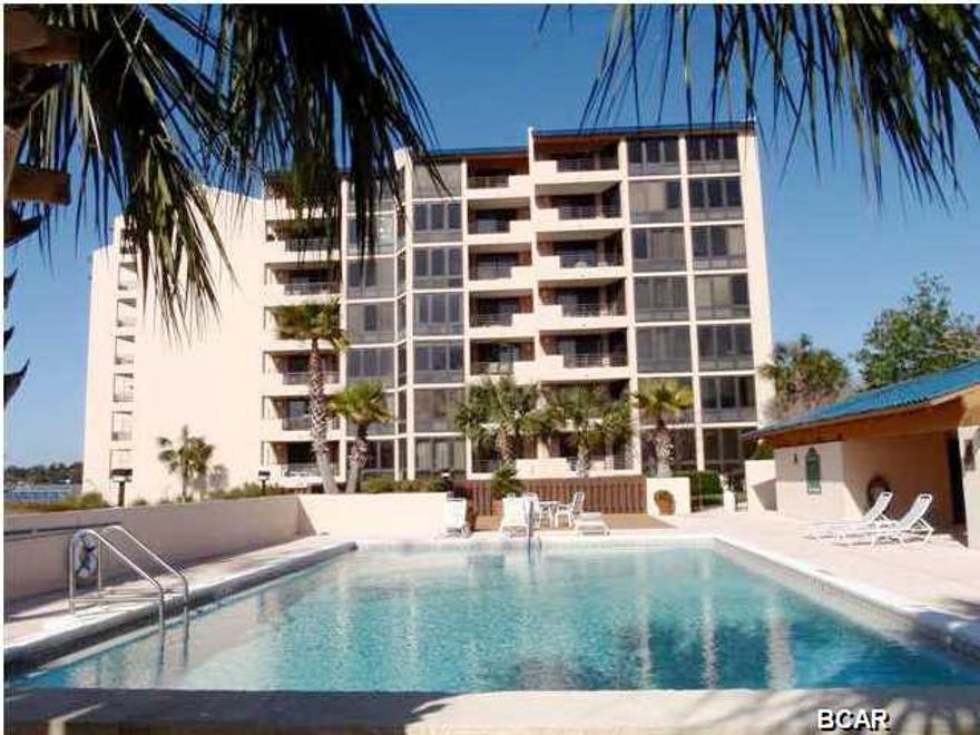 Executive Suite.   A view that WILL take your breath.   7th Floor Pent House with a spectacular view of St Andrews Bay.  Enjoy a never ending boat parade as fishing fleets return through the pass bach into harbors on beautiful Grand Lagoon.   Condo is completely furnished to include kitchen setup.  Lagoon Towers is located inside gated golf course community of Bay Point.  A lovely place to call HOME.  Owner is licensed Realtor.