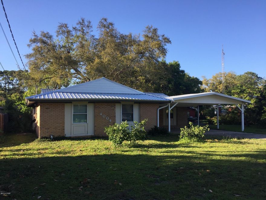 This home sits in one of the most desirable areas in Bay county!!! Walking distance to Gulf Coast Collage, the FSU campus, and the bays for fishing/boating/kayaking/ and much more!! There is plenty of parking with a 2 car covered carport and attached garage! You will love this beautiful yard that has large Oak and Magnolia trees!!!! Very open kitchen has been updated with newer cabinets Korean COUNTERYOPS and appliances! Windows have also been updated in the home! Great price on this very well maintained home! ALL SIZES ARE APPROXIMATE!! BUYER TO VERIFY!!!