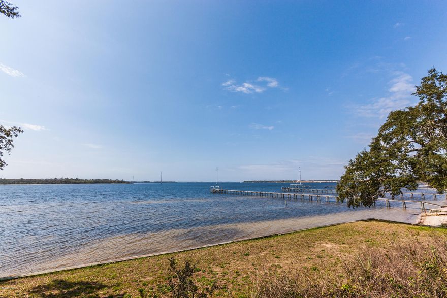 Gorgeous water front lot to buld your dream home! This is a two sided lot; on the bay side you have approx 80 x 100 (80' on the water) and across the street you'd also have approx 71x161. Build your home on the deeper lot and have a gorgeous bay view across the street and build a dock to keep your boat. Excellent location as you are just 5 minutes from Tyndall Air Force Base, schools and shopping centers.