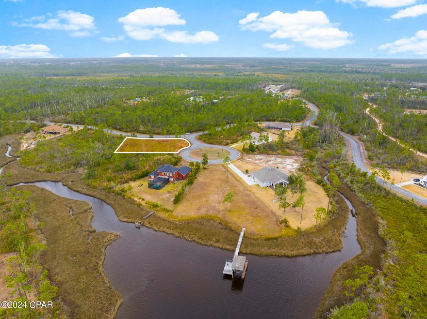 Back on the market due to buyer not being able to qualify for their loan.  Welcome to the perfect canvas for your dream coastal retreat! This vacant land, spanning over half an acre, is nestled in the prestigious Laird Bayou community, offering a rare opportunity to build your custom oasis in a serene and gated neighborhood.
This property is situated on a generous corner lot in a quiet cul-de-sac, providing not just a home but a lifestyle enriched by the privacy and tranquility of this prime location, surrounded by lush greenery and the soothing sounds of nature.
In this idyllic community, you'll have the convenience of a boat launch at your disposal, allowing you to indulge in the freedom of waterfront living. Explore the pristine waters of Laird Bayou and beyond. 
Security and exclusivity are paramount, with the property being part of a gated community. This ensures a safe and private environment for you and your loved ones. To further enhance your leisure, the community boasts a pool, inviting you to relax and cool off on hot days or enjoy a leisurely swim.
This property offers a unique opportunity to embrace the coastal lifestyle you've always dreamed of. Design and build the home you've envisioned with the stunning backdrop of Laird Bayou as your canvas.
Details of the property include a size of over half an acre, categorized as vacant land, and boasting a special feature of a corner lot in a cul-de-sac location.
Don't miss out on the chance to own a piece of paradise. Seize this opportunity to create lasting memories in Laird Bayou - where every day feels like a vacation.
Call today to schedule a private viewing and begin the journey to your dream home!