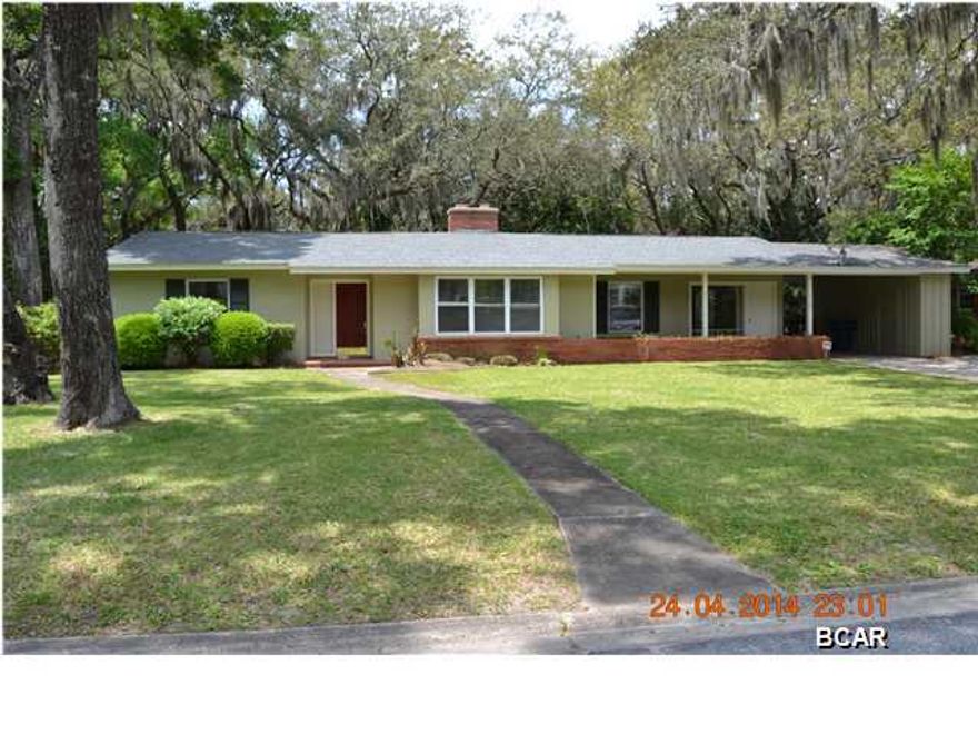 LOCATION, LOCATION, LOCATION! This home is located in the very desirable ''Cove'' neighborhood and south of Cherry St. Come see the possibilities of Cove living in this 4 bedroom, 3 bath home sitting on a 100x140 lot. The interior features hardwood flooring and a HUGE kitchen as well as a separate master bedroom suite with outside entrance, perfect for a mother in law quarters or a home office. The exterior of the home has durable stucco and the roof has recently been replaced. Seller will entertain a kitchen cabinet / flooring allowance with an acceptable offer. Come see this amazing home that is priced to sell, call your Realtor today!