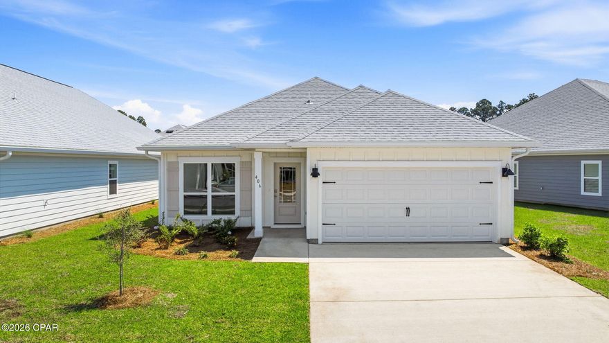 Welcome to 406 Wolcott Way, located in the Bayside at Ward Creek community in Panama City Beach. This home is ready for move in and features the Oakley floor plan that has just the right amount of open space for entertaining. As you enter the foyer, you are greeted by a flex space with a large picture window that allows the beautiful Florida sunshine to fill the front of the home. 

Continuing down the hall you will see the open concept kitchen, dining, and living area, complimented with vaulted ceilings which lend a grand feel to the heart of the home. This home has EVP flooring throughout which creates a seamless transition between rooms. The kitchen is accented with white cabinetry that is complemented by the quartz countertops and a center island. 

Nestled at the back of the home for privacy, is the primary bedroom with a spacious ensuite bathroom. The primary bathroom has a walk-in closet, soak tub, dual sink vanity with lower cabinetry and quartz countertops, and a separate shower. The additional bedrooms are located in an adjacent hall just off the kitchen and dining area. Here you will also find the full guest bathroom, linen closet for extra storage, and the laundry room with shelving above the washer/dryer hookups. Entertain with ease under the covered back patio, accessible through the full glass backdoor in the living room.