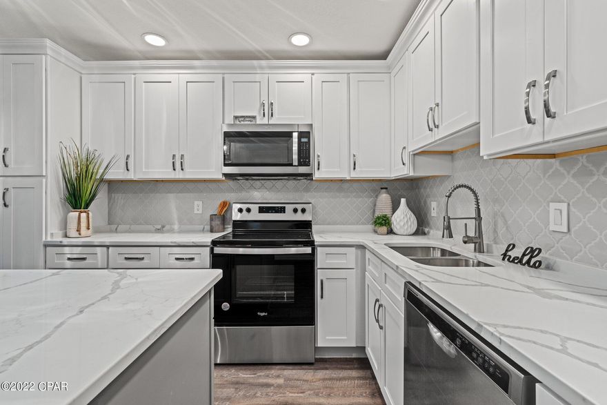 Fully remodeled move in ready home close to Tyndall Airforce Base! BRAND NEW Roof, HVAC, windows, stainless steel appliances, shaker cabinets, light fixtures, ceiling fans, vanities and new flooring throughout. Home has fresh paint. Kitchen has a gorgeous new granite island with plenty of countertop space and new shaker cabinets. Open concept living room and sliding glass doors opening to patio and big private backyard. Don't miss your opportunity to own this beautifully remodeled home! Flood Zone X. No HOA.