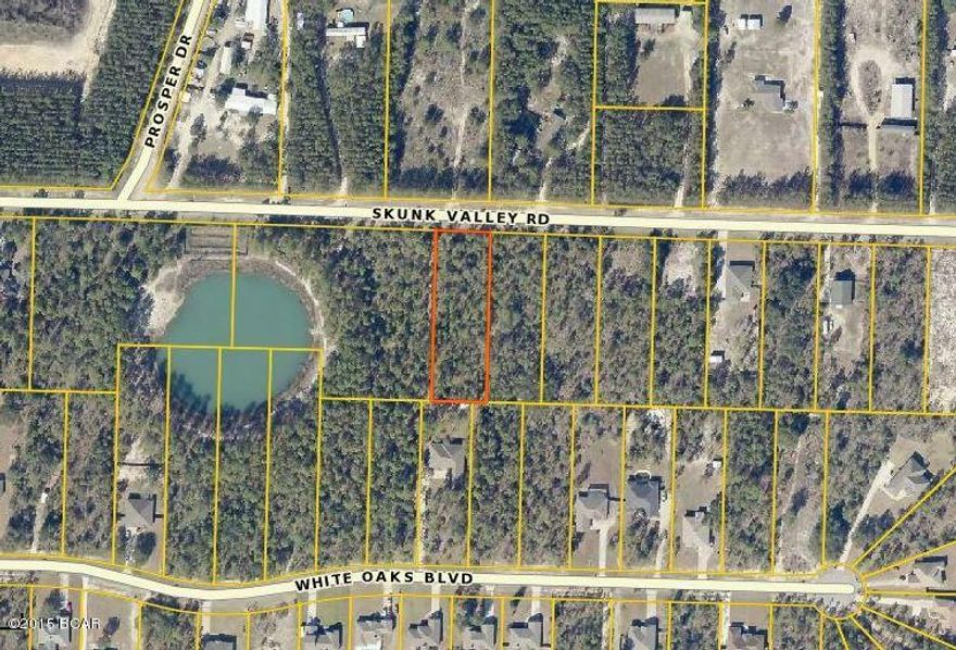 Reduced!!! Level wooded .82 acre lot in deed restricted White Oaks Subdivision ready to build on offered as is.  The lot is close a small pond and on a paved county maintained road near Bozeman Learning Center an close to Lynn Haven. This lot is just right for your dream home.