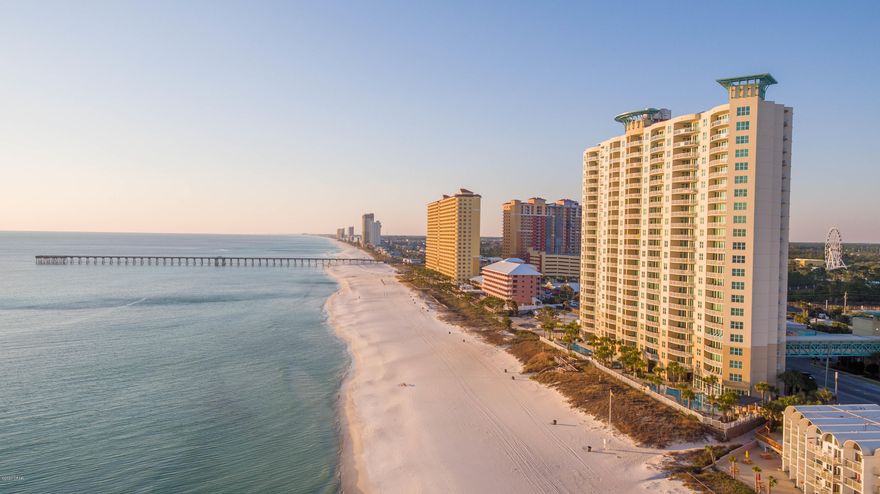 CURRENTLY UNDER CONTRACT - SELLER ACCEPTING BACK-UP OFFERS. Luxury on the Beach! Fully Furnished 3 Bedroom / 3 Bath Beachfront condo located at Aqua! A Full 180 Panoramic View of the Gulf of Mexico! Only 1/4 mile away from Pier Park, which is where All the Action takes place in Panama City Beach. Compare any other unit for sale in this Building & you will see the Added Value in not only the Quality Furnishings and Upgrades, but the Rental History is what makes this STAND OUT ABOVE THE REST! The last 3 Years has brought Sellers 50K to 55K in Gross Rentals, all while not living in it for 6 Months/12 Months. Potential of over 70k/Year!  Aqua offers some of the Best Amenities on the Beach in PCB. Owners and Guests enjoy a Heated Pool, Sauna, Large Fitness Center overlooking the beach.