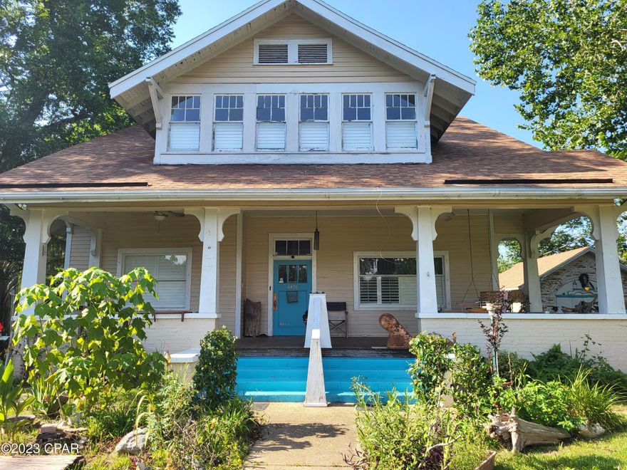 HISTORICAL HOME in downtown Marianna. Just a little TLC needed to bring this beautiful home back to a showplace.  Home features 3BR/3BA and a Study or 4th Bedroom and a formal dining room.  6 fireplaces give it lots of character, with 2 of them having gas logs. Beautiful original hardwood floors throughout. Cork flooring, granite countertops, and JennAIr Appliances in this large spacious kitchen. Other features include Leaded glass and window seat in DR, 
and Plantation Shutters thru-out. This home had major upgrades completed in 2009/10 that included new wiring, added carport and upgraded baths.  The beautiful Master Bath has a double vanity and large walk in shower.  The 2 bedrooms upstairs each have access to a front play  or sitting room. New roof in 2019. Call today to make an appointment to see how easy it will be to make this a Showplace Home.