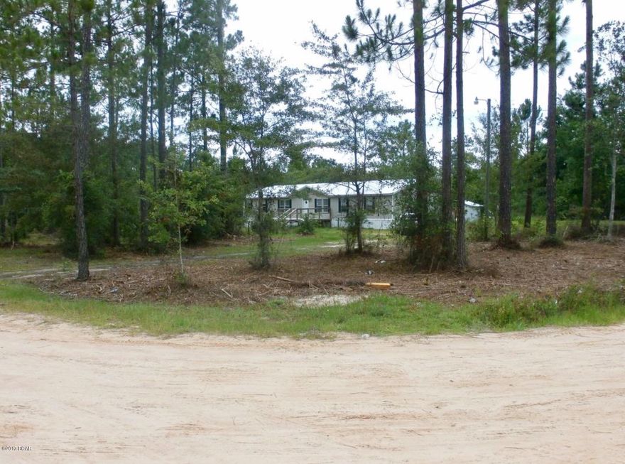 This home has everything thing you need for a large or growing family!  Split 4 bedroom plan, two baths, two living areas, large kitchen with newer appliances.  New metal roof in 2016, HAVC has 4 yr warranty on parts. Located on county maintained road, just minutes  to Fishing and Boating on Bear Creek and to beautiful Enconfina Creek.  30 mins to Panama City Mall. 

Hardware store, Grocery/Gas and restaurants.  within minutes as well.  All on a 1 acre corner lot! 

This home will not last long, call to set a time to see now.  All measurements approx./should be verified.  New Survey!