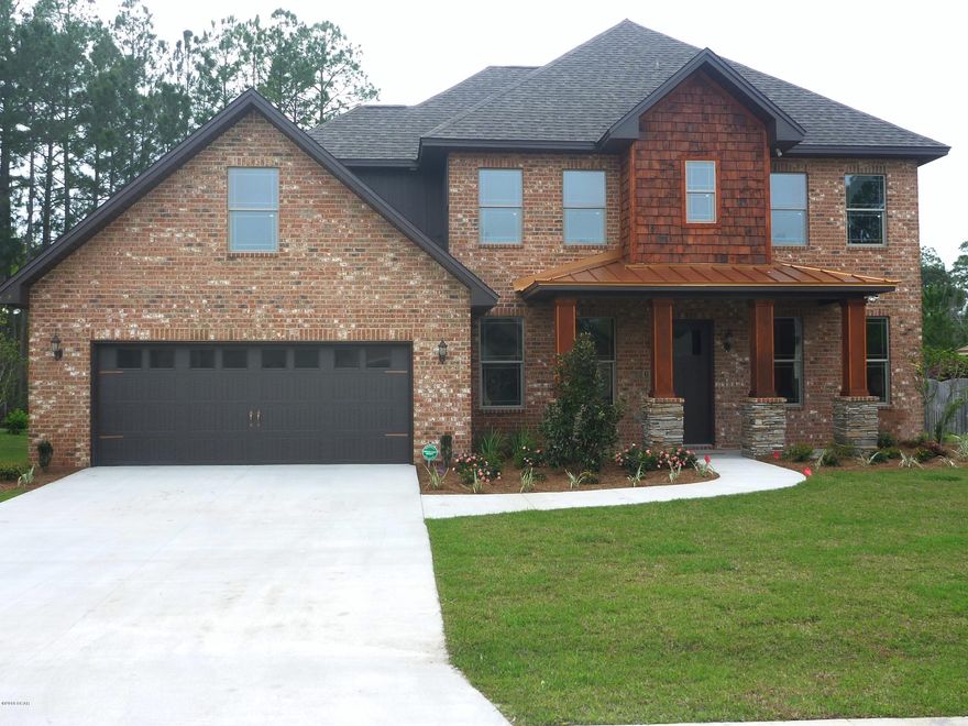 COLLEGE POINT! ALL BRICK HOME in great area, neighborhood and school district! One of the last few homes to be built in College Oaks, don't miss your opportunity to live in this lovely, quiet subdivision! This is no exception to this builder's standard home: lots of crown molding, chair rail, wainscoting, granite, tile, custom cabinets. Kit has gorgeous granite countertops and custom cabinetry, stainless appliances and pantry. Breakfast nook has a built-in buffet w/lots of storage. Formal dining room and office both have wainscoting. Huge MBR has dbl door to the MBA, which is complete with whirlpool tub, sep tiled shower, dbl granite vanity with custom cabinets. Bedrooms 2&3 share a jack and jill bath with dbl vanity & lots of storage. Both have lge walk-in closets. The bonus rm would make a great 4th bedroom, mother-in-law suite or media room! There is also a hall bath right next to the bonus room that has dbl vanity and large shower. The screened porch is a wonderful spot for family gatherings! It is beautifully detailed in cedar shakes, has a gas spigot for your grill and a beautiful gas fireplace!! Property has a private backyard that backs up to a lovely pond where you can sit and watch the birds for hours or catch a fish or two!  Age, sq ft, rm sizes, are estimates. Please measure if concerned.