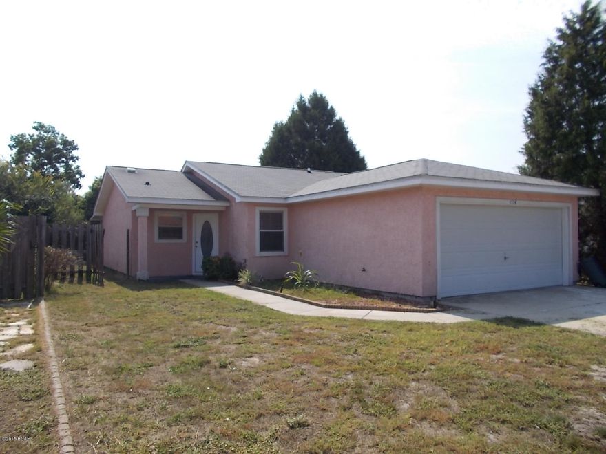 :House has been redone, looks great. New central heat and air, Kitchen was redone all new cabinets, Appliances, stove, refrigerator, microwave. All new lights, carpets, tile. all baths have been redone as well.Double garage, privacy fence in back, screened porch. Don't miss out on this  fabulous home,    Wonderful first home, if you need to down size and you want  every thing to be ready this is it, also good investment as rental property.