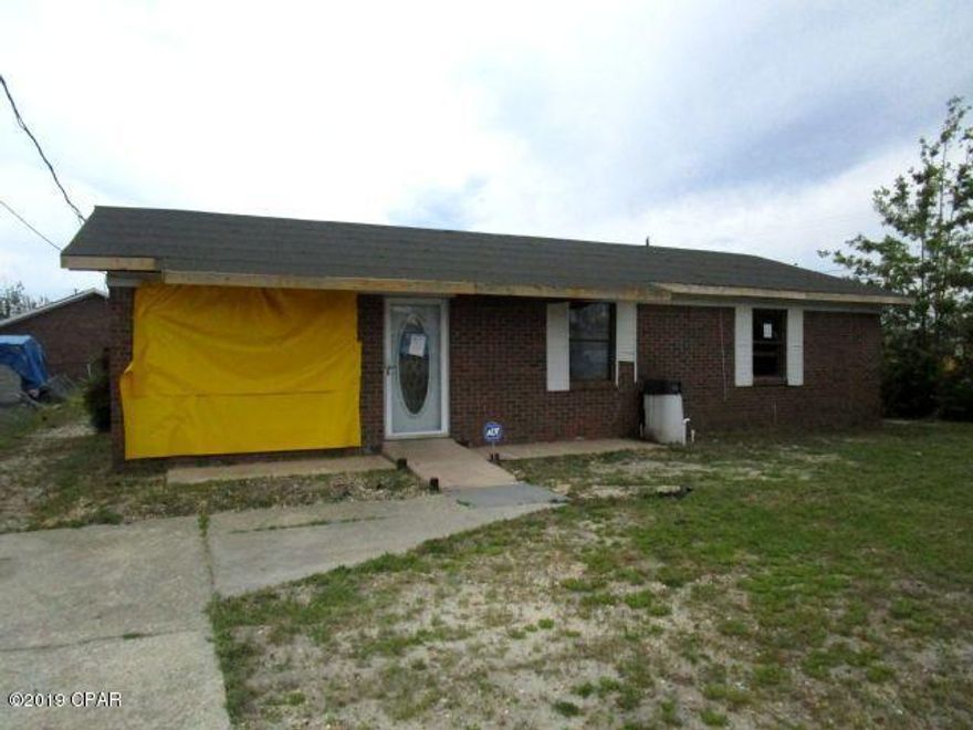 SITUATED ON A CORNER LOT, this home is ready for shingles, has been gutted and you will be ready for restoration!  The home features a kitchen area off the living room,  a family room and loads of areas for possible storage.  With the home down to the studs, this is the time to make all of the changes necessary to make this house a real home!  Home being sold in its AS IS condition for cash only.