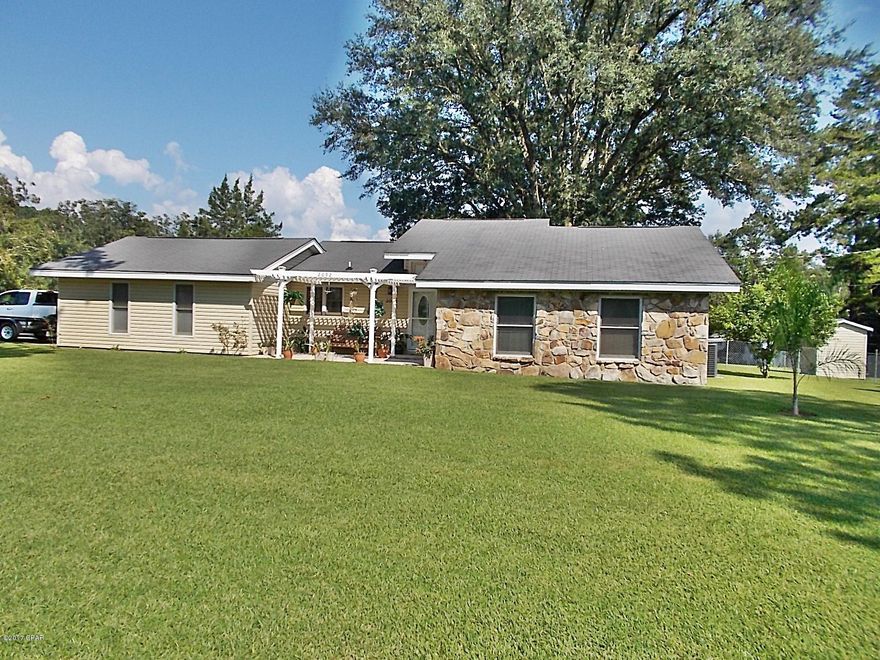 Very nice 3 bedroom 2 1/2 bath home in city limits, chain link fenced corner lot, updated kitchen with new ref,stove,microwave, large dining room, vaulted ceiling in living room with lots of natural light, new carpet in bedrooms and hall,and some new interior paint, central vacuum system, two car garage, 8x20 Florida room with a new storm door,mature pecan trees, 4in deep well for in-ground sprinkler system, there was a new 4 ton 15 sear Heat Pump installed this year, also some new water plumbing updated all  very close to Lake Seminole,priced to sell.