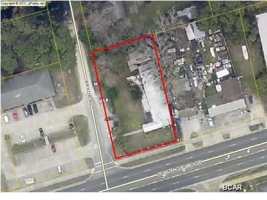 Property is situated on the NE corner of Front Beach Road and Pryor Avenue.  Property has 112 feet along Front Beach Road and 200 feet along Pryor Avenue.  Property is zoned Commercial Zoned GC-2. Property is currently improved with 4,384 SF improvement, with improvement is sold in ''As Is'' condition. Containers on property may be removed prior to the sale. Property is ideal for a variety of development, retail, office, warehouse, restaurant, service industry, etc. Possible short term owner financing. Please bring all written offers! Possible Owner Financing.