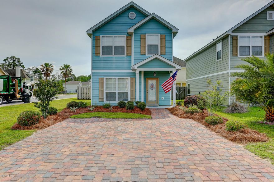 2 STORY FLORIDA COTTAGE IN HARRISON'S WALK - COMMUNITY POOL. The interior of this attractive home features 3 bedrooms, 2.5 baths, a good floor plan, an updated kitchen, crown molding, raised ceilings and an interior laundry room. The kitchen boasts granite counter tops, stainless steel appliances (all convey PLUS washer & dryer), a kitchen island, a huge pantry and a dining area. The exterior features a privacy fenced backyard, a paver driveway, irrigation and a back patio. This home is centrally located and is a short drive to Pier Park and the Beach. Harrison's Walk is a quaint neighborhood with underground utilities, a community pool and cute Florida Cottage homes. The HOA is inexpensive and covers the community pool, your trash and the upkeep of the common grounds. This home is located in an X flood zone so flood insurance is not required but is optional. All information derived from seller and public record; measurements approximate.