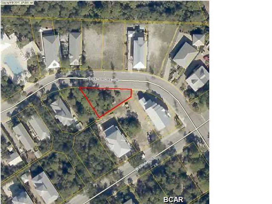 L-7 is an unusually shaped lot addressing the curve of a road and in a great location, close to the Bellview Park swimming pool, tennis courts, basketball court, children's playground and park. One of the few remaining lots for sale in Carillon Beach. It has a lovely home designed by architect Michael Hunnicutt that may be negotiated separately from the lot.