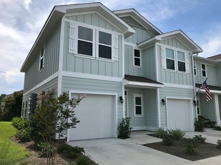 HUGE PRICE REDUCTION - NEW never lived in Waterfall townhome END UNIT!   This home was purchased in January 2019, but never lived in! This home boasts 9' ceilings on the 1st floor, and 8' on second floor. The living area is spacious and inviting with luxury vinyl flooring, granite tops, and plenty of cabinet/storage space.  The half bath is located on 1st floor while all bedrooms and two full baths are on second floor.  The master suite is very large and master bath offers a double vanity, tiled shower, and walk in closet. HOA fees cover management, landscaping/storm clean up as well as insurance for exterior structure.  Come see for yourself and tour this beautiful home and neighborhood, complete wish lush landscaping and a community pool!