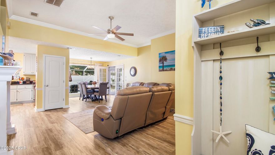 Discover your dream Panama City Beach retreat in this stunning 3-bedroom, 2-bath home with a sparkling pool and sunroom, nestled in the exclusive Summer Breeze community on a serene cul-de-sac. Move-in ready, this meticulously updated gem lets you embrace the coastal lifestyle from day one. Step into an open-concept living space featuring sleek granite countertops in the modern kitchen, perfect for hosting friends or enjoying quiet evenings. The split-bedroom layout ensures privacy, with a luxurious master suite boasting a cozy sitting area overlooking the pool—your personal oasis. The expansive enclosed pool area is an entertainer's paradise, ideal for lively gatherings or unwinding after a sun-soaked day at the beach. No detail has been overlooked: fresh interior paint, stylish new flooring, modern light fixtures, and vibrant landscaping with your very own orange and lime trees plus an outdoor shower for rinsing off sandy toes. Energy-efficient upgrades like extra attic insulation keep utility bills low, while reinforced attic flooring and custom shelving provide ample storage. This home has it all—modern comforts, prime location, and a lifestyle that screams relaxation and fun. Don't miss your chance to own this coastal masterpiece. Just blocks from the beach in a Golf Cart friendly neighborhood. All Furnishings and street Legal Golf Cart are negotiable. Schedule a showing today and start living the beach life you've always dreamed of!